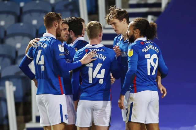 Pompey celebrate Sean Raggett's goal against Oxford. Picture: Joe Pepler