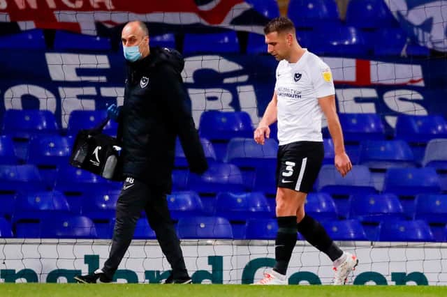 Lee Brown leaves the Portman Road pitch in the second half with a hamstring injury.
