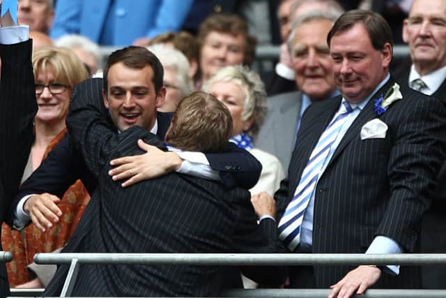 Harry Redknapp embraces owner Sacha Gaydamak following Pompey's FA Cup final triumph in May 2008, with chief executive Peter Storrie looking on. Picture: Nick Potts