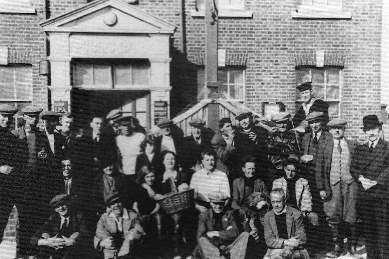 Regulars at the Old Oyster House, Locksway Road,, Milton, outside their 'new' pub in the 1940's