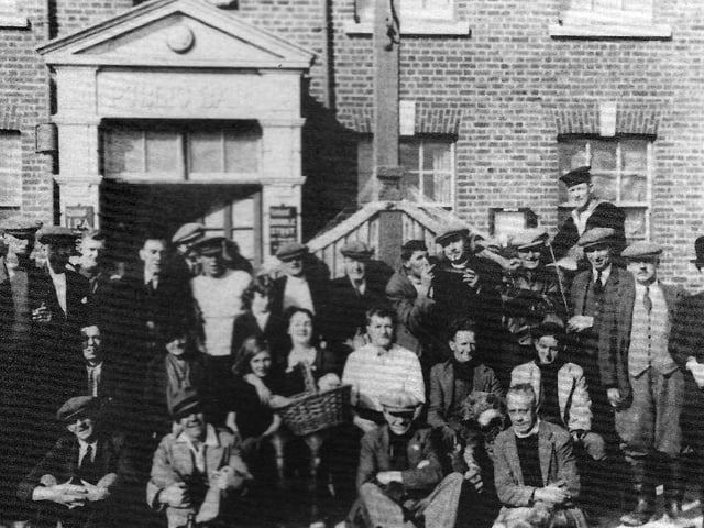 Regulars at the Old Oyster House, Locksway Road,, Milton, outside their 'new' pub in the 1940's