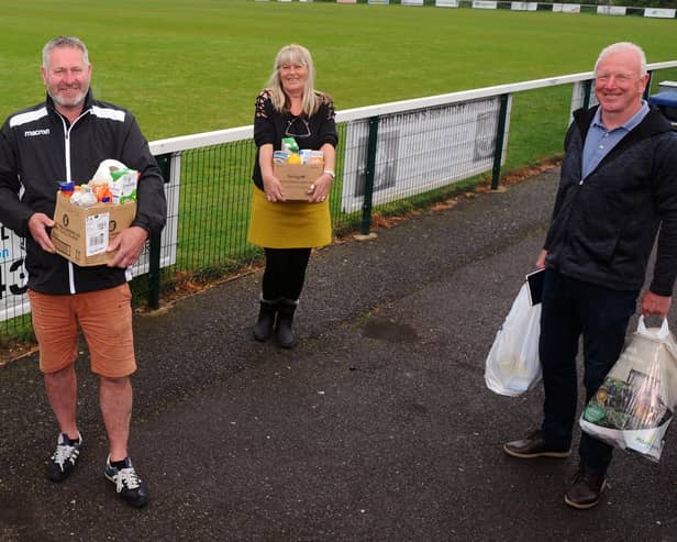 AFC Portchester Covid-19 Support Group members pictured in April 2020 (from left) Paul Kelly (AFC Portchester chairman), Julie Sexton and Steve Johnson. Picture: Sarah Standing