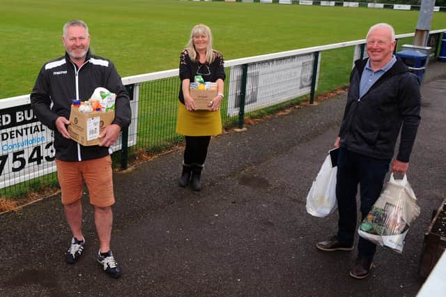 AFC Portchester Covid-19 Support Group members pictured in April 2020 (from left) Paul Kelly (AFC Portchester chairman), Julie Sexton and Steve Johnson. Picture: Sarah Standing