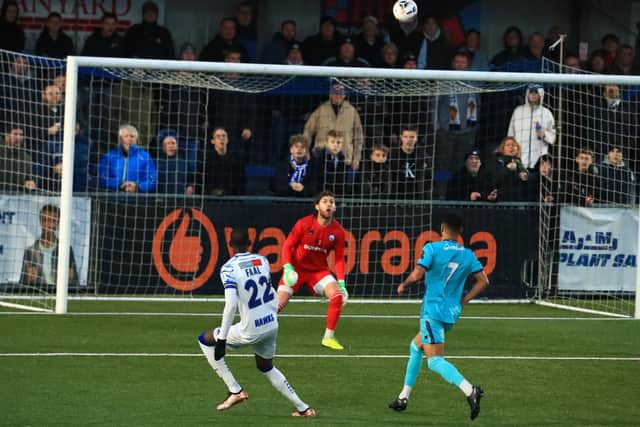 Mo Faal lobs keeper Jack Sims to score his second goal against Braintree. Picture by Dave Haines