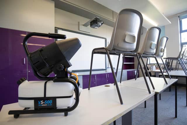 A fogging machine, which can disinfect a whole classroom, is set up in a classroom at Ark Charter Academy.
Photo: Andrew Matthews/PA Wire
