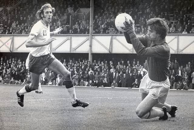 Pompey striking great Ray Hiron, pictured here against Cardiff in 1974, scored 117 goals in 364 appearances. He passed away on Sunday at the age of 76