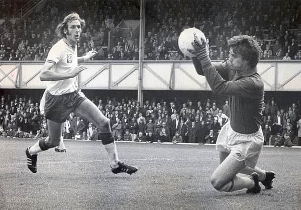 Pompey striking great Ray Hiron, pictured here against Cardiff in 1974, scored 117 goals in 364 appearances. He passed away on Sunday at the age of 76