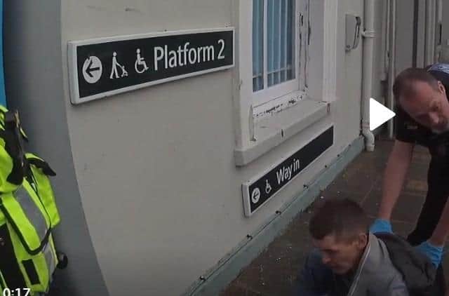 Martin Nobes spits at police. Credit: Wessex CPS