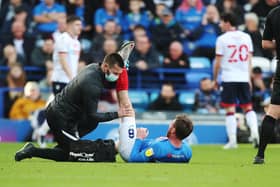 Ryan Tunnicliffe after being injured against Bolton