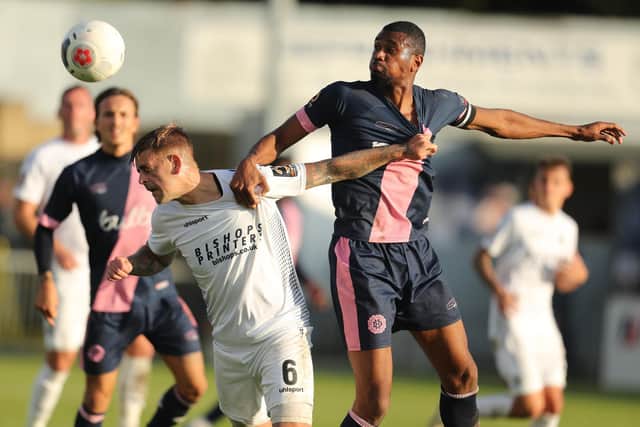 Sam Magri battles with Dulwich's Danny Mills during last season's FA Cup tie at Westleigh Park. Photo by Dave Haines