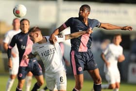 Sam Magri battles with Dulwich's Danny Mills during last season's FA Cup tie at Westleigh Park. Photo by Dave Haines
