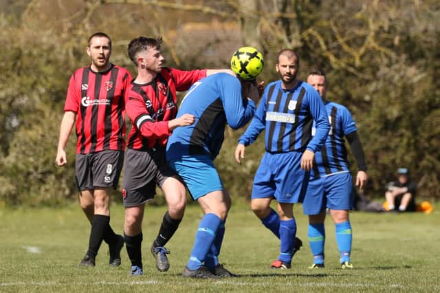 Jonny McMullen (red/black, second left) was 'amazed' he didn't score with a header as Rowner Rovers stunned Mid-Solent League Division 2 champions-elect Carberry 2-1. Pic: Kevin Shipp
