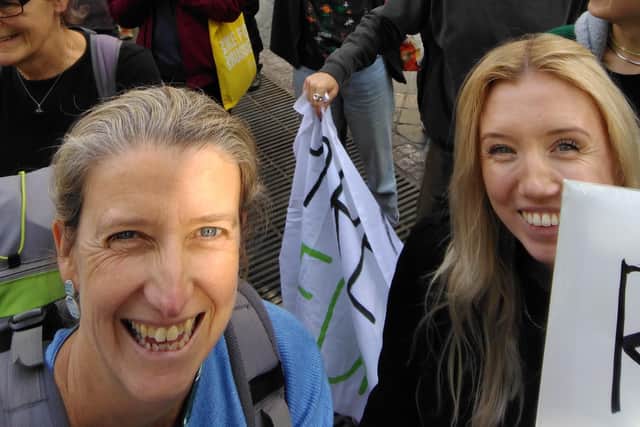 Clare Seek (left) at the Fixfest 2022 protest in Brussels, Belgium