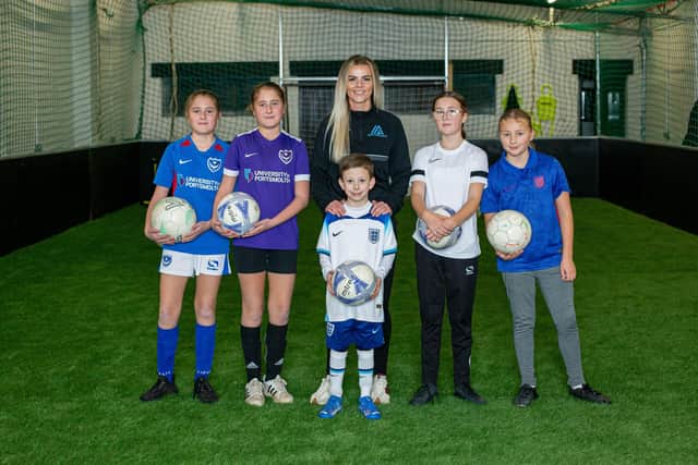 Brittany Jeal has oppened a new football unit in North End, Portsmouth on Monday 19th December 2022

Pictured: Brittany Jeal with some of the first visitors, Sophia 11,Izzy 11, Henry 7, Evie 11 and Ffion 11 at the new indoor football ground in North End, Portsmouth

Picture: Habibur Rahman