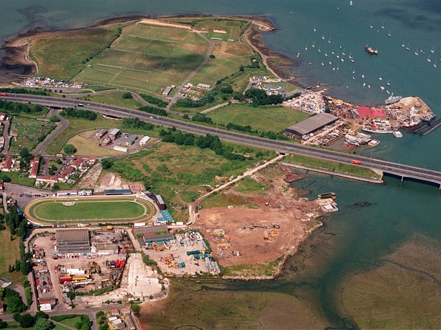 The area of land at Tipner, Portsmouth, bisected by the M275 motorway entrance to Portsmouth, with the greyhound stadium and Pounds yard at bottom left, and the Tipner ranges with Pounds shipbreakers at top. Picture: Mike Scaddan 993153-22