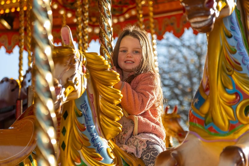 Pictured - Ella-Rae Townsend, five, enjoying the merry-go-round.