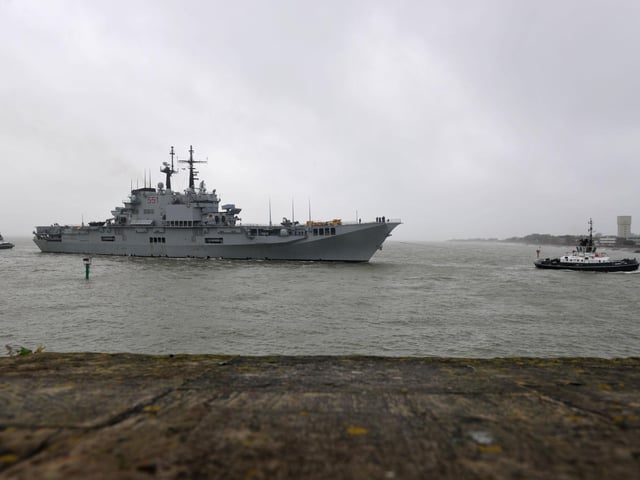The Giuseppe Garibaldi is brought into the harbour