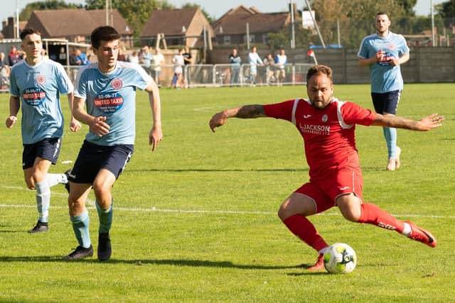 Bobby Scott fires in a shot as Horndean go in search of more goals against Poppies. Picture: Keith Woodland