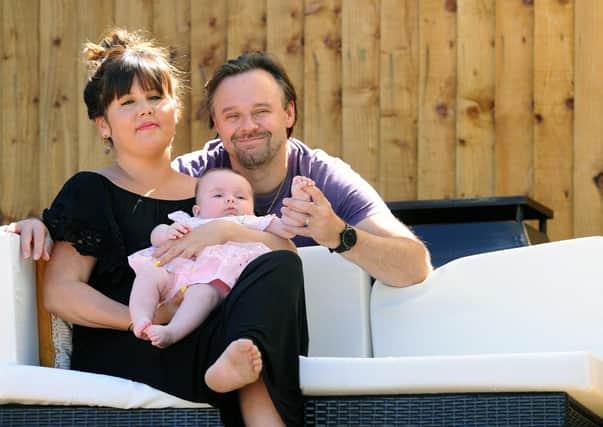 Cheryl (37) with her husband Matt Kingston (40) and their daughter Harley (4 months old).

Picture: Sarah Standing (260520-3068)