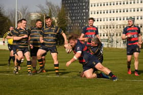 Will Rolfe forces his way over for the first of his two tries in US Portsmouth's 54-12 Hampshire One victory as they ended their home campaign on a high note against the Isle of Wight Picture: Keith Woodland