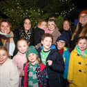 The Hillyard, Palmer, Cooper, Lee-Davey and Burgess-Langford families at the switch-on of the Christmas lights in Palmerston Road, Southsea 
Picture: Chris Moorhouse   (jpns 251121-57)