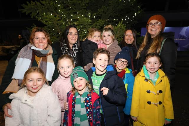 The Hillyard, Palmer, Cooper, Lee-Davey and Burgess-Langford families at the switch-on of the Christmas lights in Palmerston Road, Southsea 
Picture: Chris Moorhouse   (jpns 251121-57)