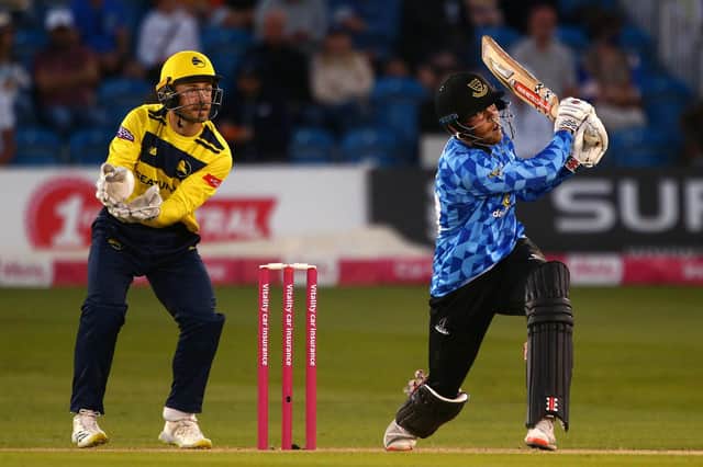 Phil Salt hits out against Hampshire. Photo by Charlie Crowhurst/Getty Images.