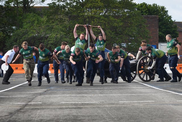 HMS Collingwood held its annual Open Day featuring the Brickwood's Field Gun competition. Visitors were not only treated to a variety of events but were able to tour some of the training facilities at the Establishment. Also there was a fair, entertainment trade, charity and military stands. The field gun completion was won HMS Seahawk for the third consecutive time.Picture: HMS Collingwood A crew.