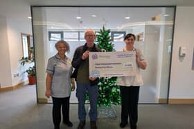 Andrew Lane and Rowans Hospice Physiotherapy Staff, Paula (left) and Emily (right)