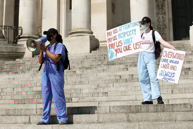 Naomi Singh, left, and Madeleine Myers. NHS pay protest, Guildhall Square, Portsmouth
Picture: Chris Moorhouse (080820-06)