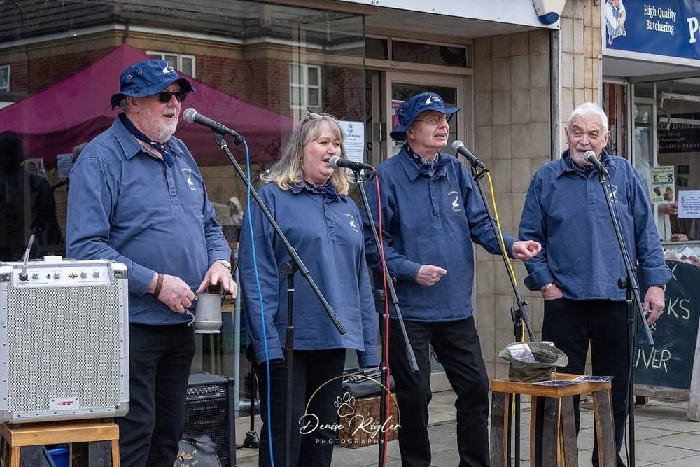 There were sea shanty singers at the first market.