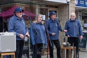 There were sea shanty singers at the first market.