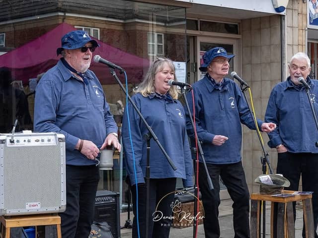 There were sea shanty singers at the first market.