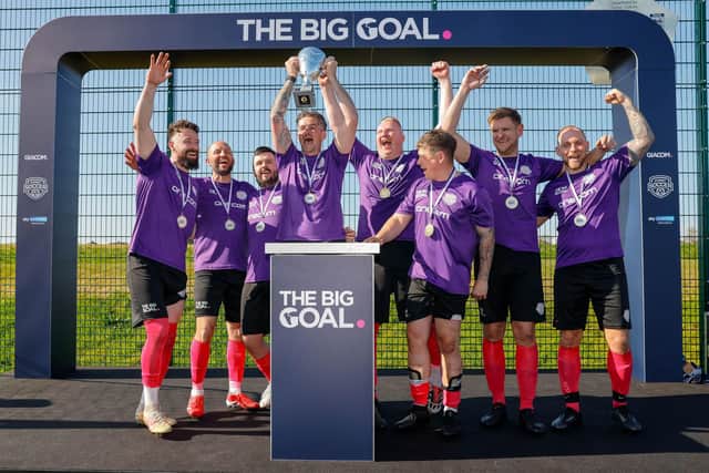 Onecom celebrate their Big Goal triumph