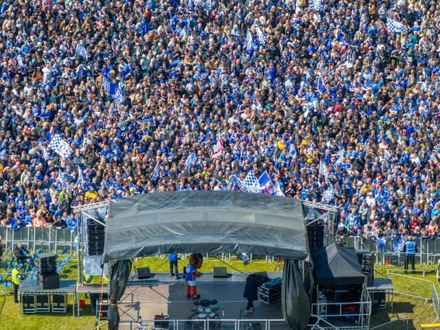 Thousands of Pompey FC fans flocked to Southsea Common to celebrate the team's League One title and promotion. Picture Credit: Marcin Jedrysiak