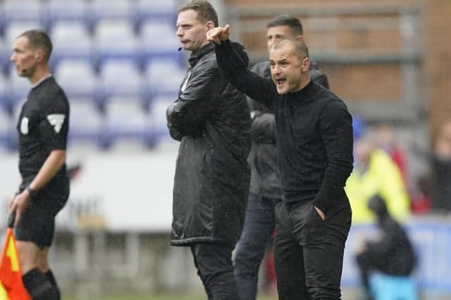 Wigan boss Shaun Maloney saw his side reduced to 10 men as they suffered a 2-1 defeat to Pompey at the DW Stadium