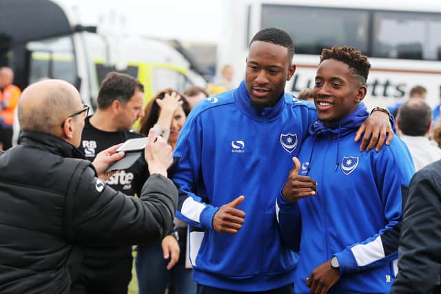 Nicke Kabamba (left) and Jamal Lowe have been team-mates at Hampton & Richmond and Pompey - and remain the best of friends. Picture: Joe Pepler