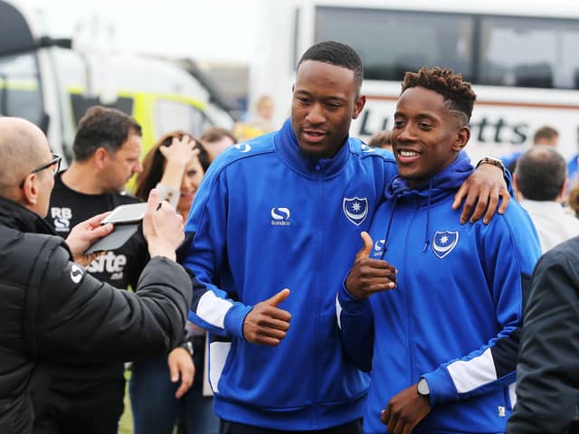 Nicke Kabamba (left) and Jamal Lowe have been team-mates at Hampton & Richmond and Pompey - and remain the best of friends. Picture: Joe Pepler