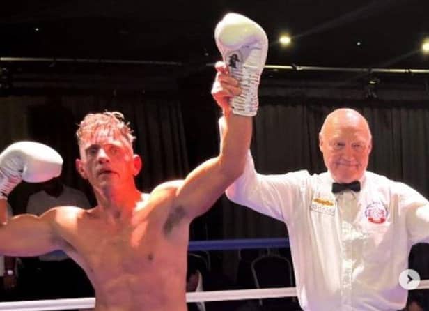 Liam Griffiths has his hand raised after claiming a points victory over Dale Arrowsmith in his comeback South Parade Pier bout