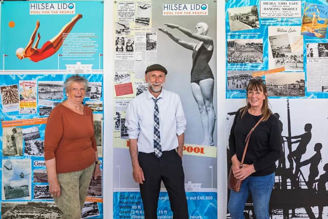 Sabrina Richards, John Sadden (who created the display) and Helen Downing-Emms against the new display telling the story of Hilsea Lido. Picture: Mike Cooter (090721)