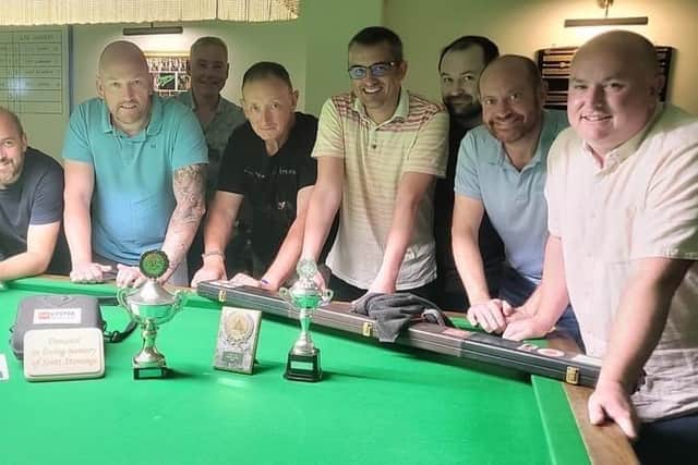 A father of two who sadly died last year has been remembered by his friends who have raised money for a defibrillator by playing snooker, a game that he loved. 
Pictured: Scott Stoneage's friends