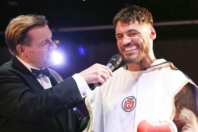 Joel McIntyre, right, is all smiles after landing a knock-out victory over Nikita Basin. Picture: Barry Zee