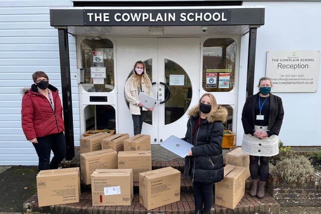 The Cowplain School takes delivery of 55 donated laptops. (left to right) Learning support assistant Sophie Dennis, Nicky Porter from DXC.technology, assistant headteacher Lindsey Everritt and learning support assistant Natasha Hewitt.