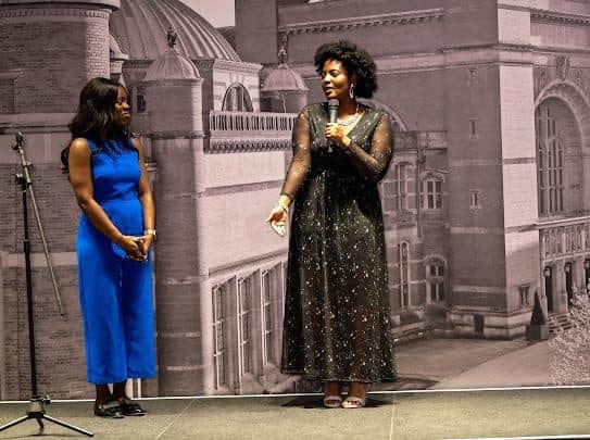 Agapé Thamar receiving her award at the ceremony.