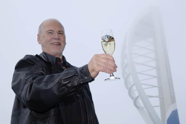 Kevin Francis from Fareham celebrates his £1,000,000, top prize win on a Merry Millions scratchcard from The National Lottery at Gunwharf Quays in Portsmouth in November 2019. Picture: Luke MacGregor