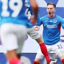 Ronan Curtis celebrates scoring against Oxford United in the recent League One play-offs
