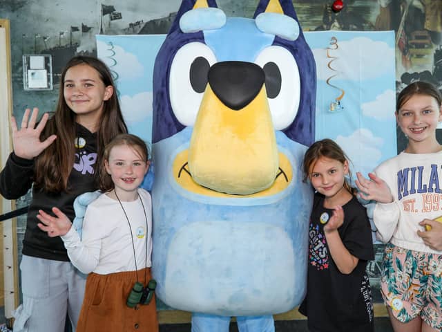 Children and parents meet Bluey at the Spinnaker Tower From left, Dakota Abbott, 10. Halle Mancell, 8, Freya Mancell, 7, and Peyton Mancell, 11. Picture: Chris  Moorhouse (290524-38)