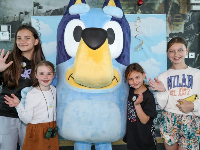 Children and parents meet Bluey at the Spinnaker Tower From left, Dakota Abbott, 10. Halle Mancell, 8, Freya Mancell, 7, and Peyton Mancell, 11. Picture: Chris Moorhouse (290524-38)