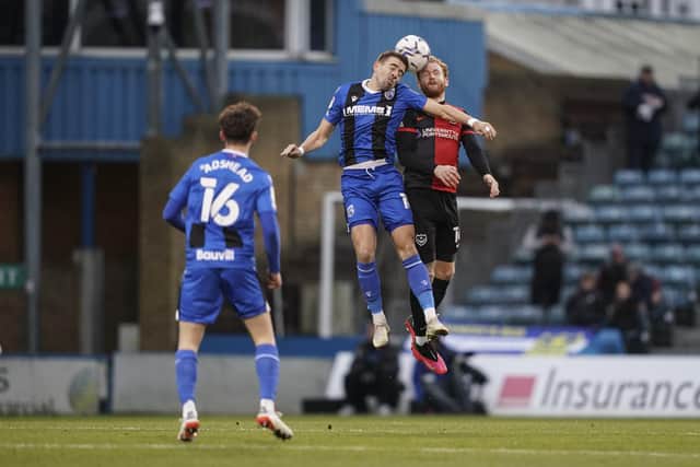 Pompey man of the match Connor Ogilvie wins another aerial dual in Saturday's 1-0 victory at Gillingham. Picture: Jason Brown/ProSportsImages
