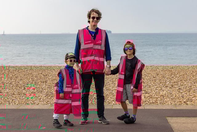 Parkrun volunteer Lewis Tatt with sons Tommy, 5, and Terry, 7. Picture: Mike Cooter